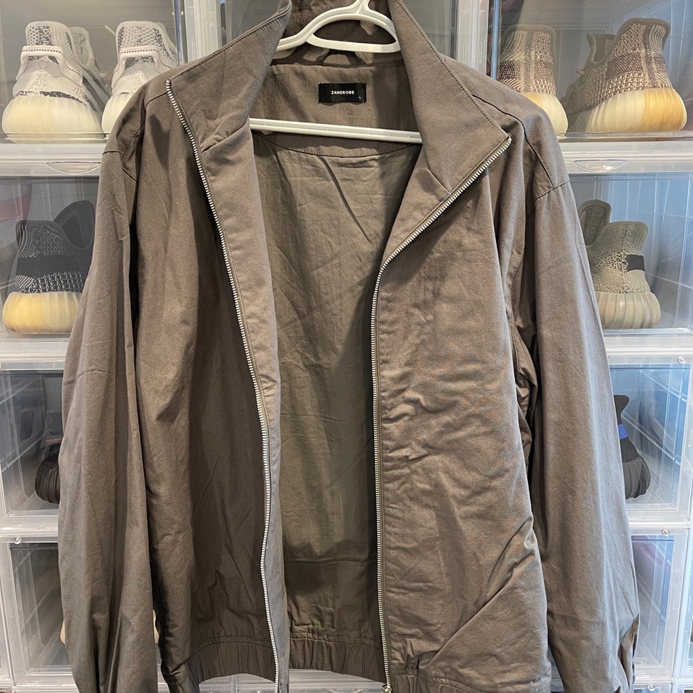 Zanerobe green zip up jacket.